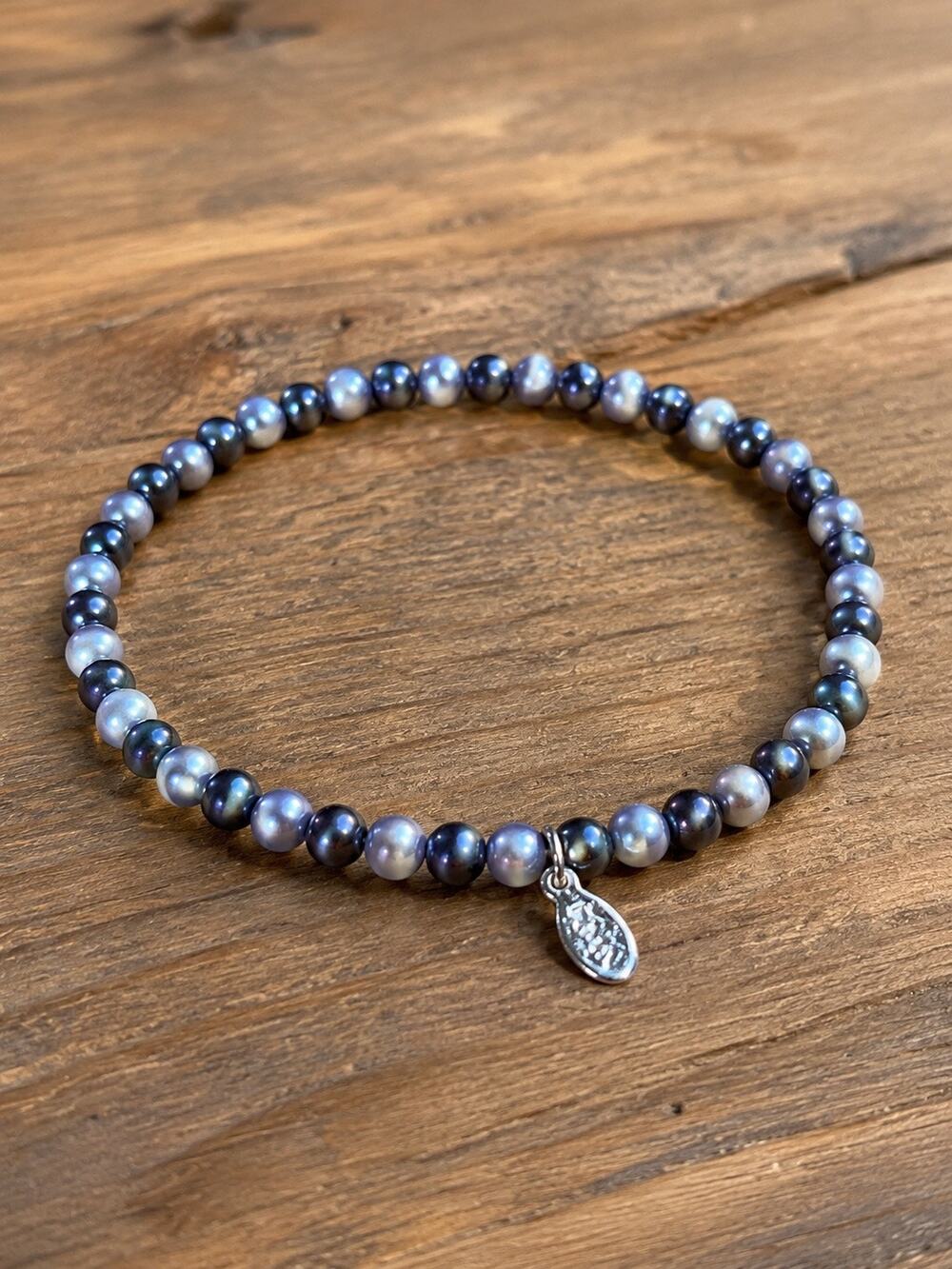RMN Silver Tone Beaded Bracelet